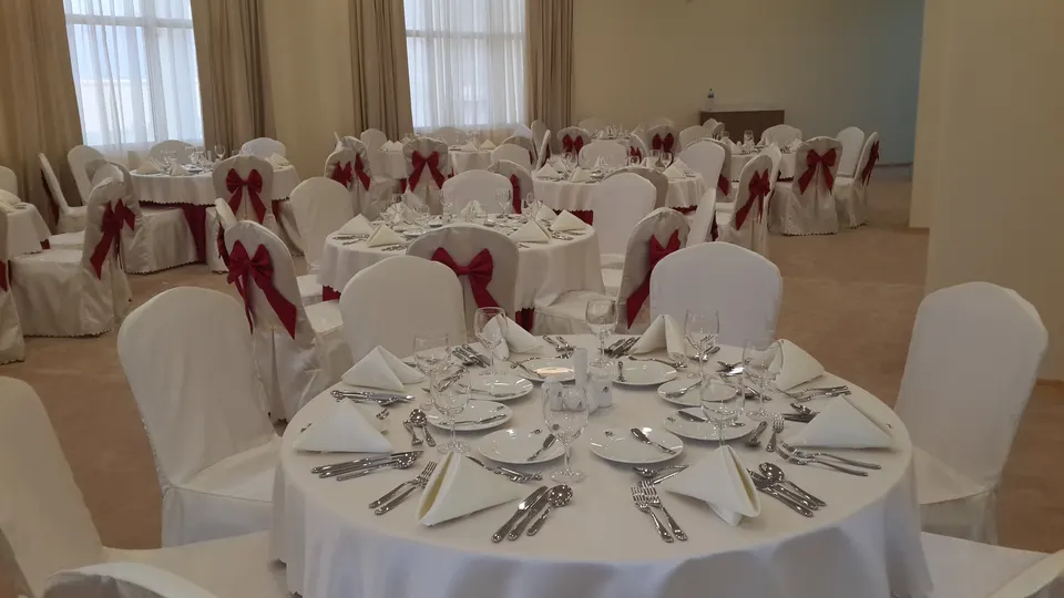 Banquet hall fully set for service, project-period photograph, Oman 2014